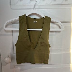 Green cropped tank top.
